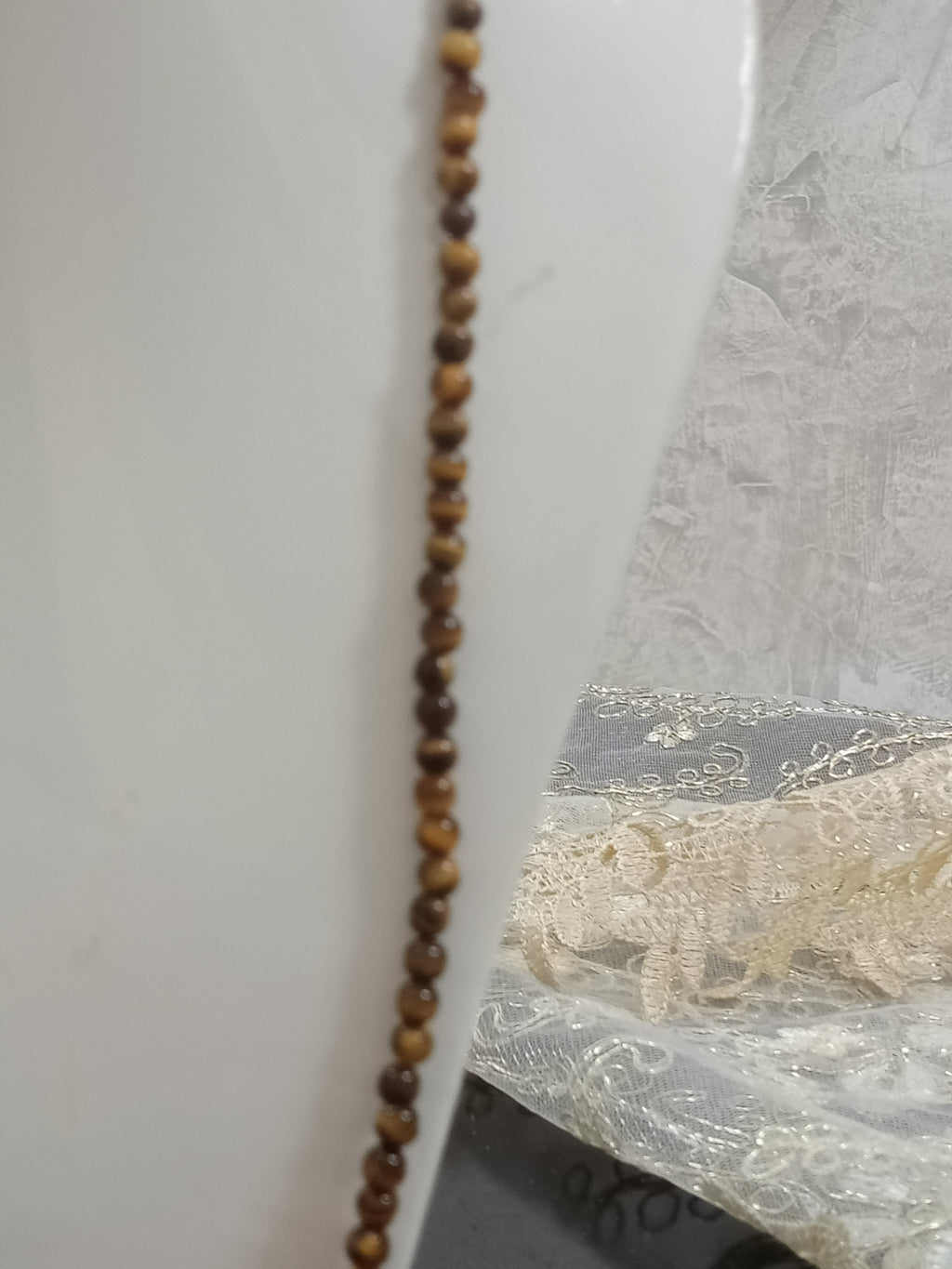 عقد طويل من حجر عين النمر